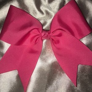 Pink bow with a clip back